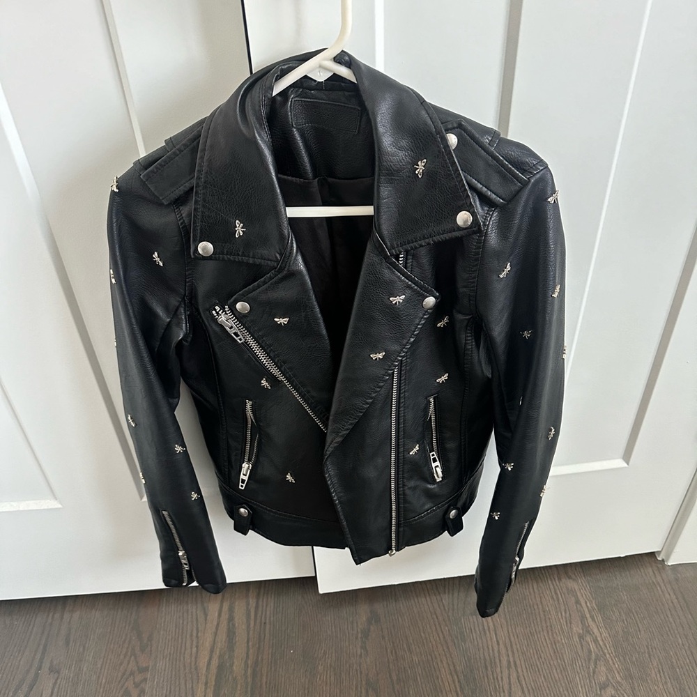 Butterfly detailed leather jacket.